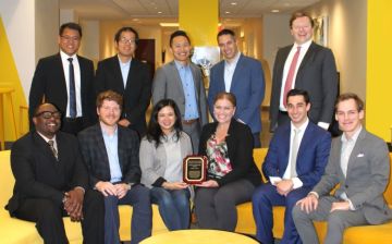 Liberty Mutual team with trophy