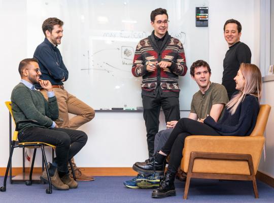 Jacob Andreas with research lab members